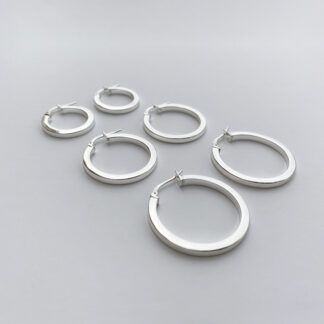 Square thread hoop earring.